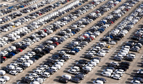 Aerial view of vehicles across a PRISM facility yard
